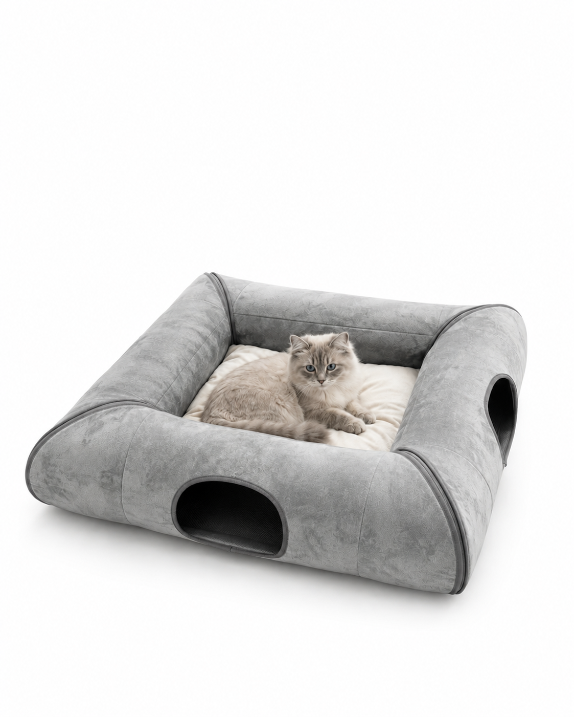 Cat resting on the soft center cushion of a gray foldable cat tunnel bed