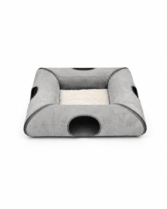 Gray foldable cat tunnel bed with two opposite entrances, two breathable mesh panels, and a soft center cushion