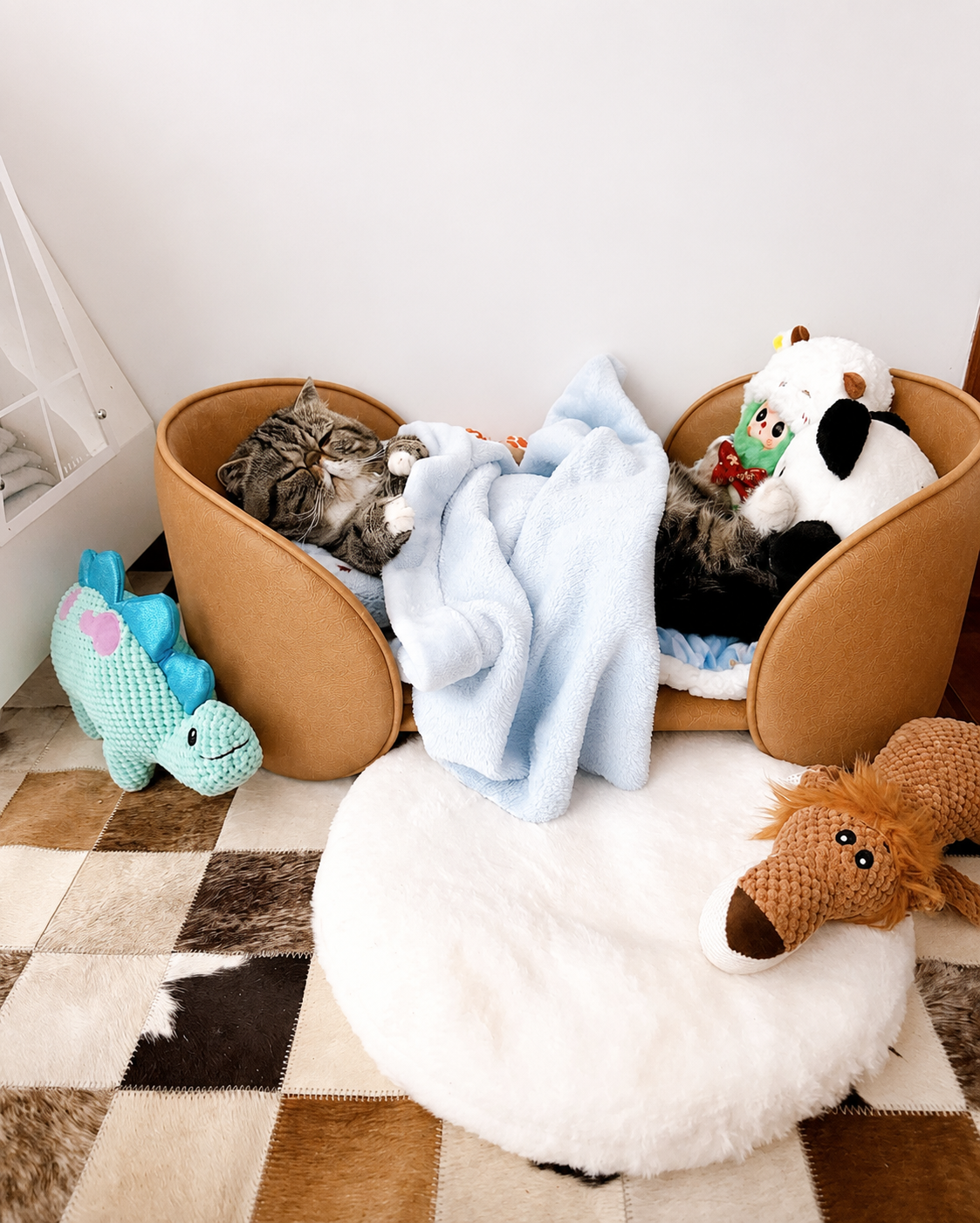 Henry Pet Sofa Bed in Camel Tan with a cat resting in a cozy room